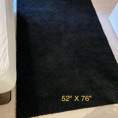 Lot 56  Black Shag Area Rug  52" X 76"