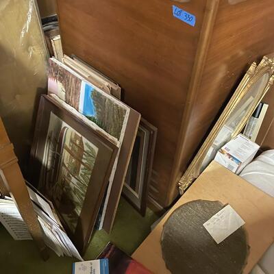 lot 330- large cabinet, speakers, lights, misc. frames and pictures