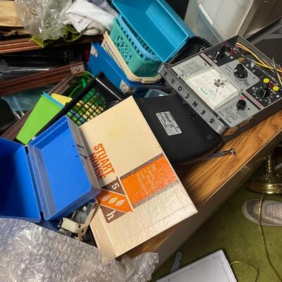 lot 334- misc. plastic containers, bookshelves, misc. items