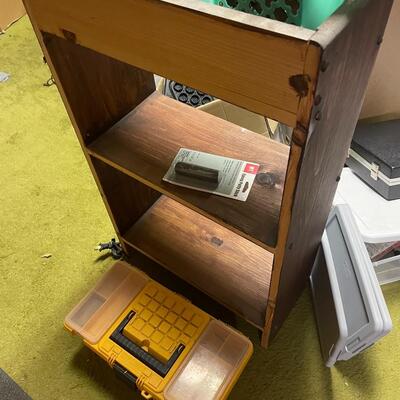 lot 334- misc. plastic containers, bookshelves, misc. items