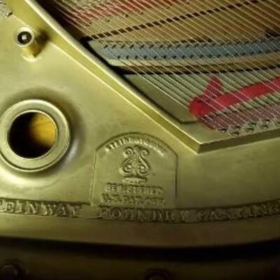 lot 349- Steinway and Sons piano model B serial #281015 appraised for $40,750.00 with stool