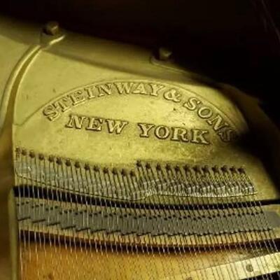 lot 349- Steinway and Sons piano model B serial #281015 appraised for $40,750.00 with stool