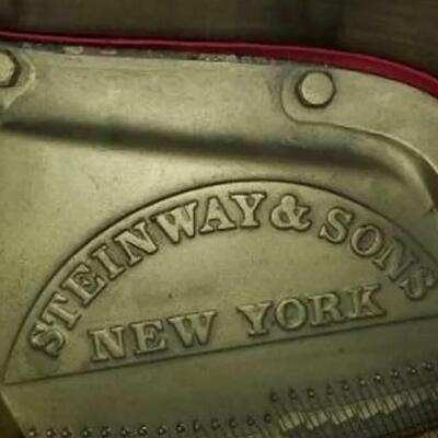 lot 350- Steinway and Sons piano 1920 walnut model L serial #203831 appraised $21,520.00