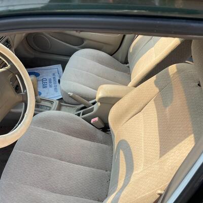 lot 352- 2001 Toyota Corolla 4s green runs great. Title is clear and in hand!