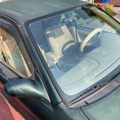 lot 352- 2001 Toyota Corolla 4s green runs great. Title is clear and in hand!