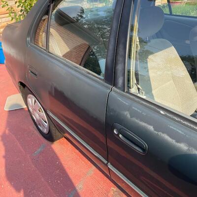 lot 352- 2001 Toyota Corolla 4s green runs great. Title is clear and in hand!