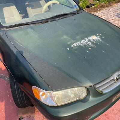 lot 352- 2001 Toyota Corolla 4s green runs great. Title is clear and in hand!
