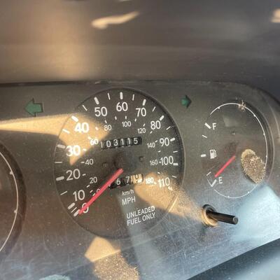 lot 353- 1997 Toyota Corolla 4s silver runs great. Title is clear and in hand!