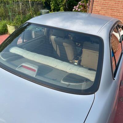 lot 353- 1997 Toyota Corolla 4s silver runs great. Title is clear and in hand!