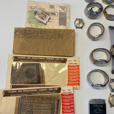 lot 354- stamps, Colonial Revolutionary currency antique reproduction, lighter, watches, lighter