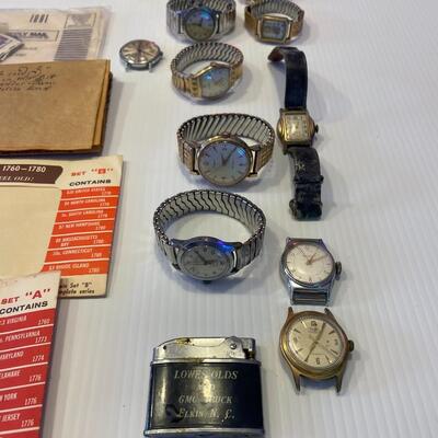 lot 354- stamps, Colonial Revolutionary currency antique reproduction, lighter, watches, lighter
