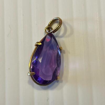 lot 357- 14K gold and amethyst pendant