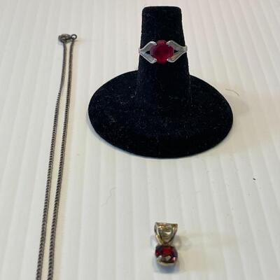 lot 364- Sterling silver necklace, ring, and charm
