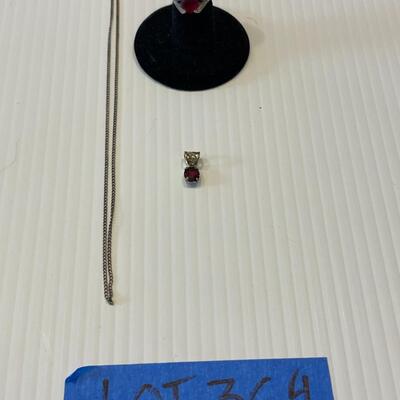 lot 364- Sterling silver necklace, ring, and charm