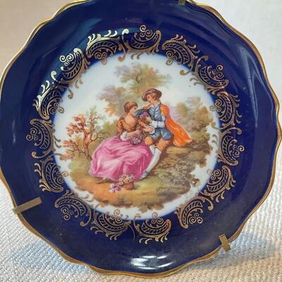 LOT 48 - Limoges veritable porcelaine d art courting couple blue trinket plate with stand