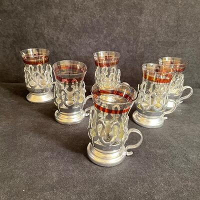 Lot 230  Vintage Tea Glasses in Metal Holders