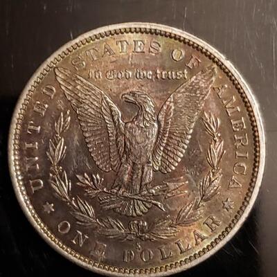 1879  S Gold toned morgan silver dollar .Very beautiful details ..
