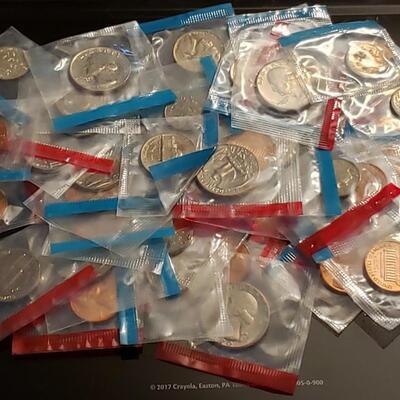 Lot of 1970,s uncirculated mint coins  1 pound unsearched all in mint packaging 50 c to 1 c aproxx 70 coins 