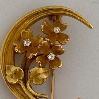 Lot J1 - Small gold tone pendant/pin with clear stones