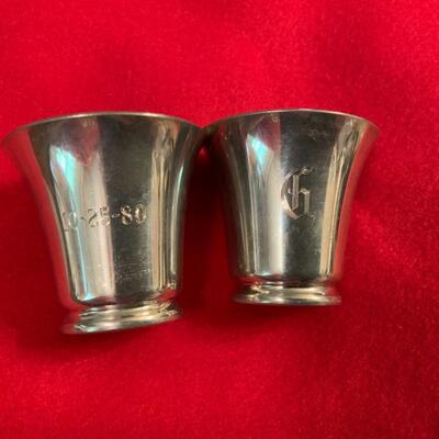 2 SHOT GLASSES WITH KENNEDY HALF