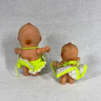 Pair of Rubber Vinyl Jointed Kewpie Dolls with Crochet Outfits