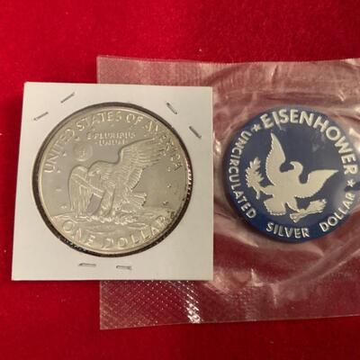 UNCIRCULATED 40% SILVER IKE DOLLAR AND PRESIDENTIAL COA COIN