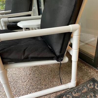 Lot 310  Pair of PVC  Outdoor Chairs with Side Table
