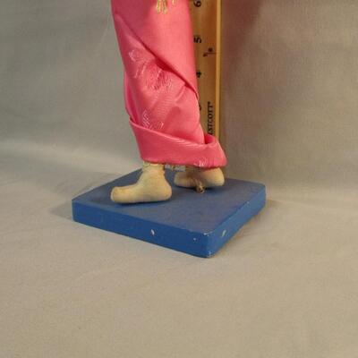 Lot 10 - Korean Doll on Base