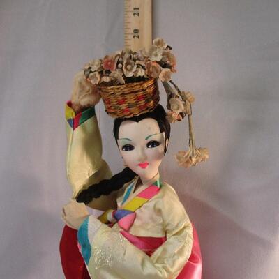 Lot 10 - Korean Doll on Base