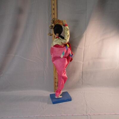 Lot 10 - Korean Doll on Base