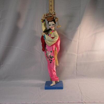 Lot 10 - Korean Doll on Base