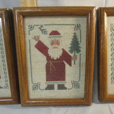 Lot 15 - (3) Framed Needlepoint Santas