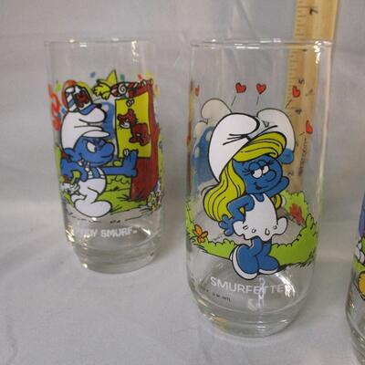 Lot 22 - (5) 1983 Smurf Collector Glasses