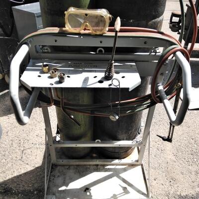 LOT 51 OXY ACETYLENE TANKS ON PORTABLE CART WITH ACCESSORIES 