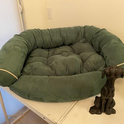 Lot 372  Dog Bed and Iron Doorstop