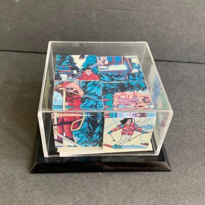 Lot 166:  Lady Skier Zeni Scupture, Block Puzzle & More