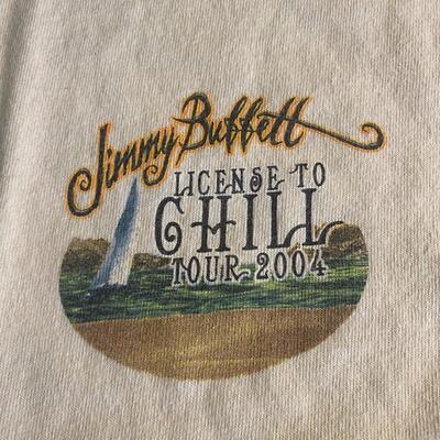 Lot 366: Jimmy Buffett Concert Teeâ€™s, Cdâ€™s & Book