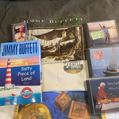 Lot 366: Jimmy Buffett Concert Teeâ€™s, Cdâ€™s & Book