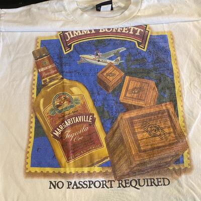 Lot 366: Jimmy Buffett Concert Teeâ€™s, Cdâ€™s & Book