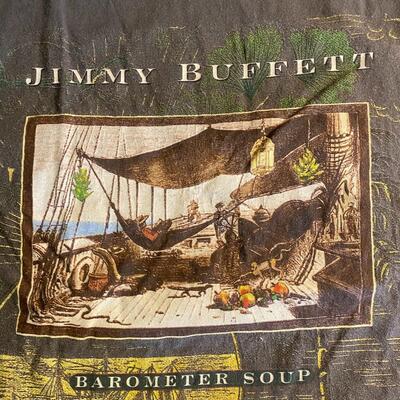 Lot 366: Jimmy Buffett Concert Teeâ€™s, Cdâ€™s & Book