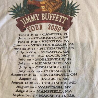 Lot 366: Jimmy Buffett Concert Teeâ€™s, Cdâ€™s & Book