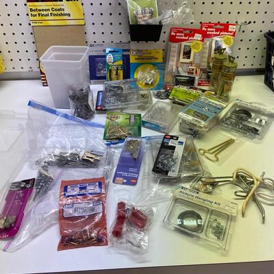 lot 409  Garage Misc with Picture Hanging Items