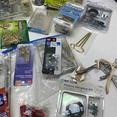 lot 409  Garage Misc with Picture Hanging Items