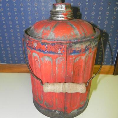 LOT 21  TWO OLD OIL OR GAS CANS