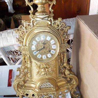 19 Century French Table clock with gilt and European design.