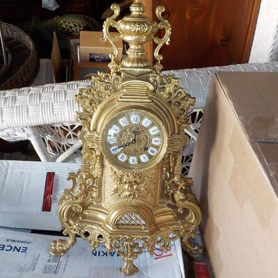 19 Century French Table clock with gilt and European design.