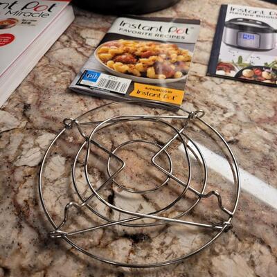 Lot 22: Instant Pot with Multiple Recipe Books and Manual 