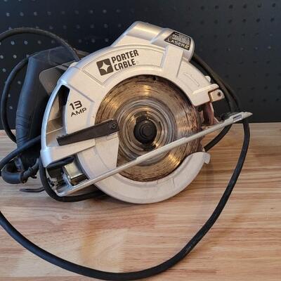 Lot 185: PORTER CABLE 7 1/4" 13 AMP Hand Saw WORKS