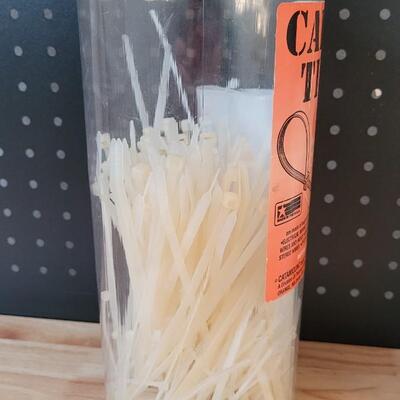 Lot 216: Cable Ties and Picture Hanging Kit 