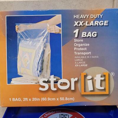 Lot 260: 1/2 Full POWER PACS Laundry Detergent Bucket + New XXL Storage Bag
